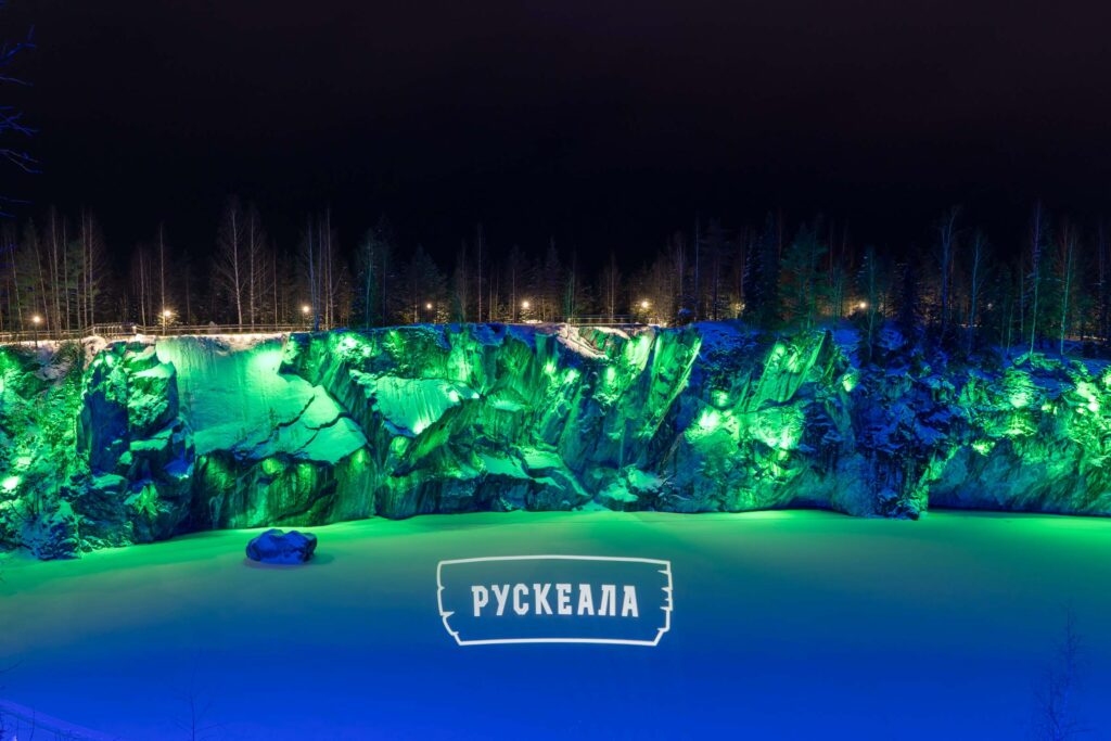 Панорама Рускеала, зеленая подсветка и логотип